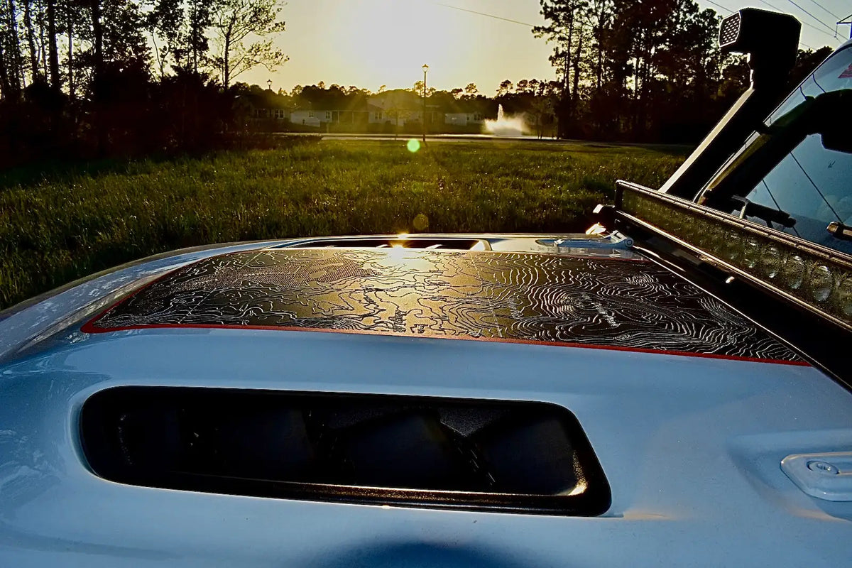 Jeep Rubicon hood with topographic map vinyl decal insert at sunset by Sticky Vinylz